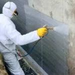 Water Proofing Worker doing Water Proofing Work
